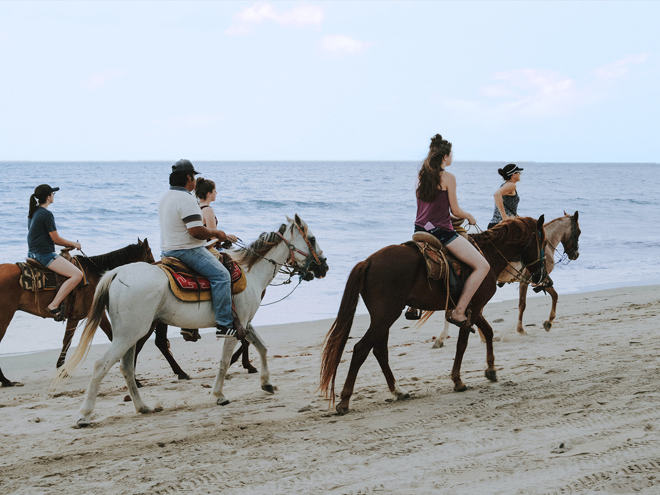 horse back riding on beach